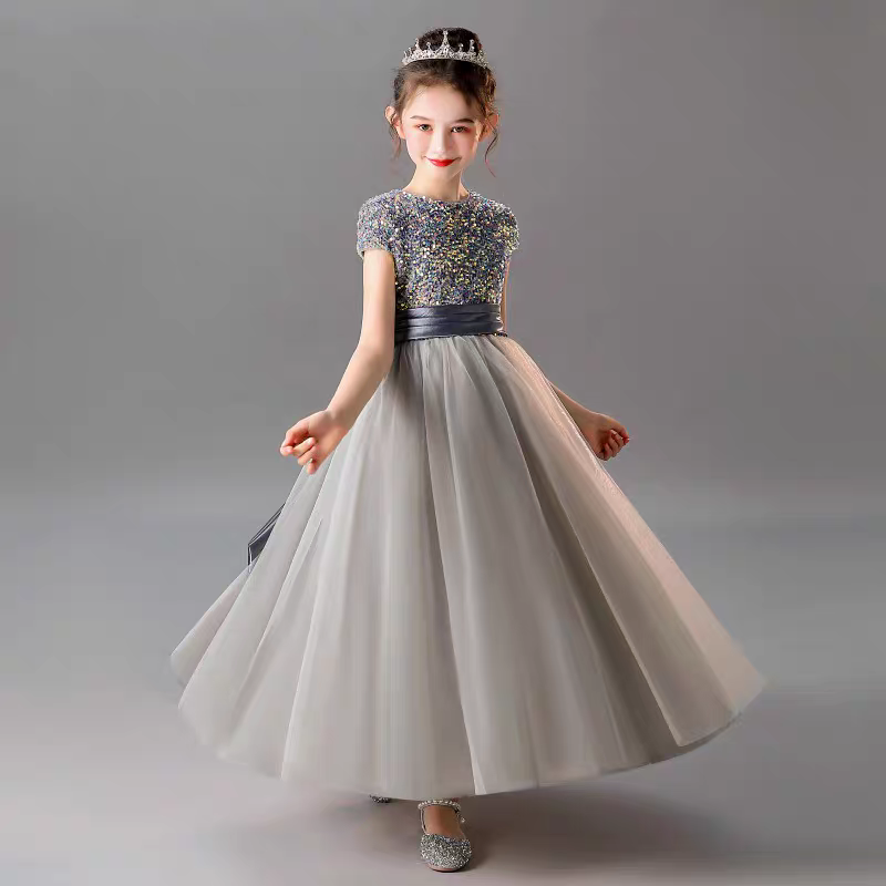 Girl in sequin bodice gray tulle gown with crown, perfect for special occasions.