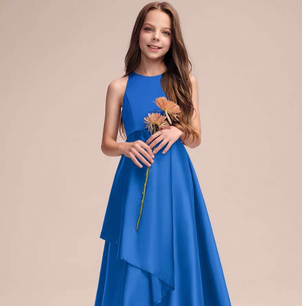 Girl in blue formal dress holding flowers. Sleeveless, layered special occasion dress for girls.