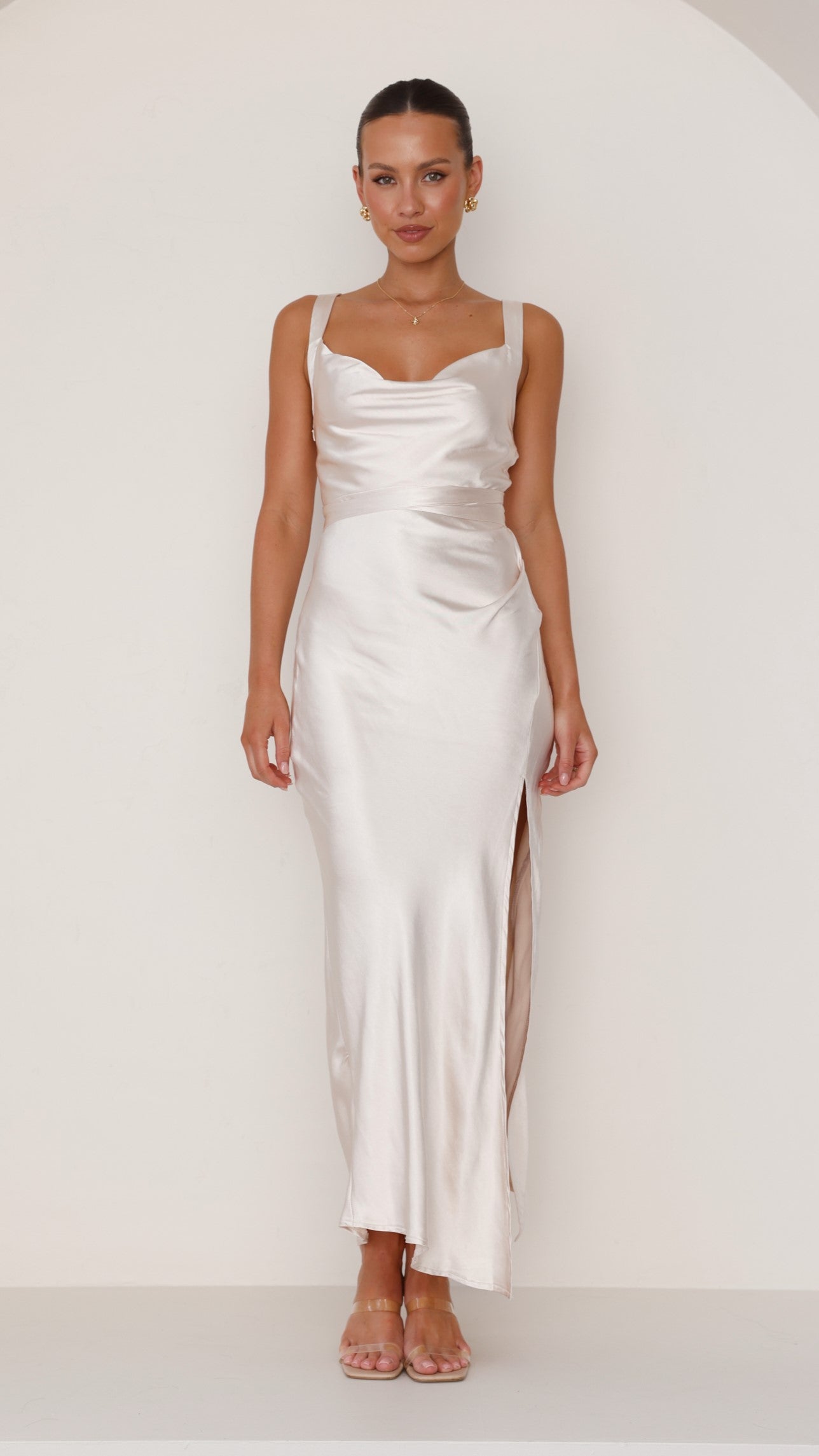 Champagne satin maxi dress with cowl neck and side slit.