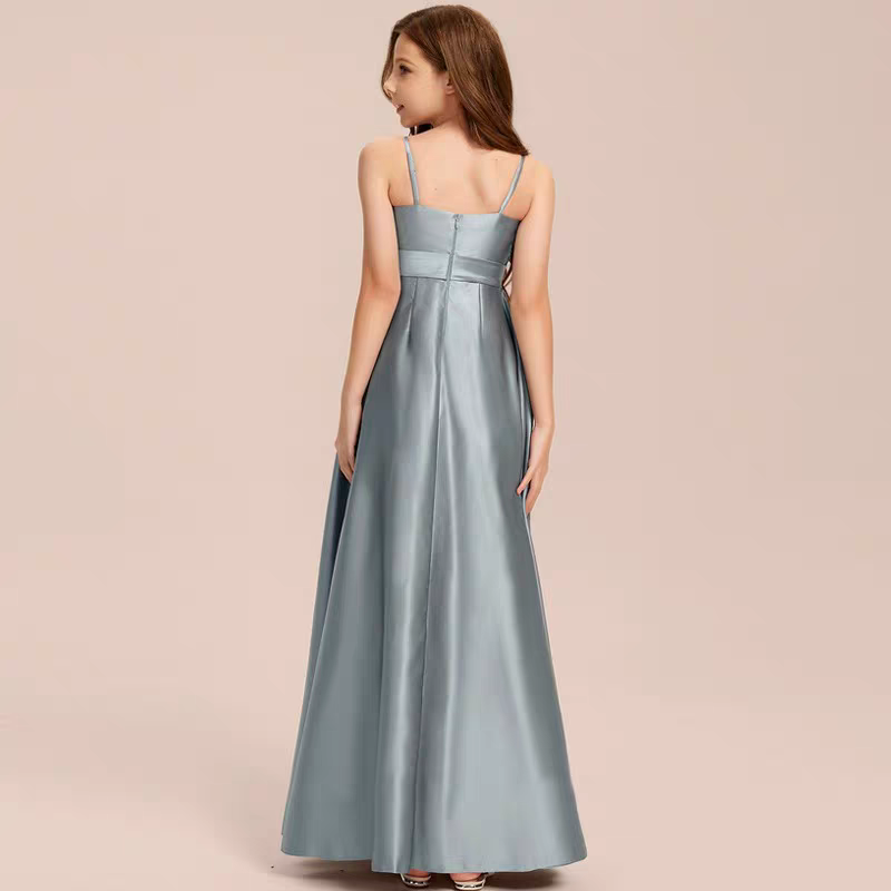 Back view of a girl wearing a long, sleeveless, blue satin formal dress.