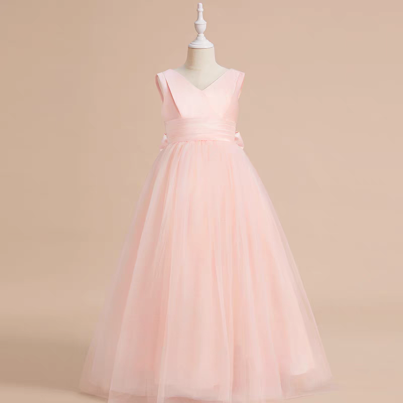 Pink tulle flower girl dress with sash, sleeveless v-neck.