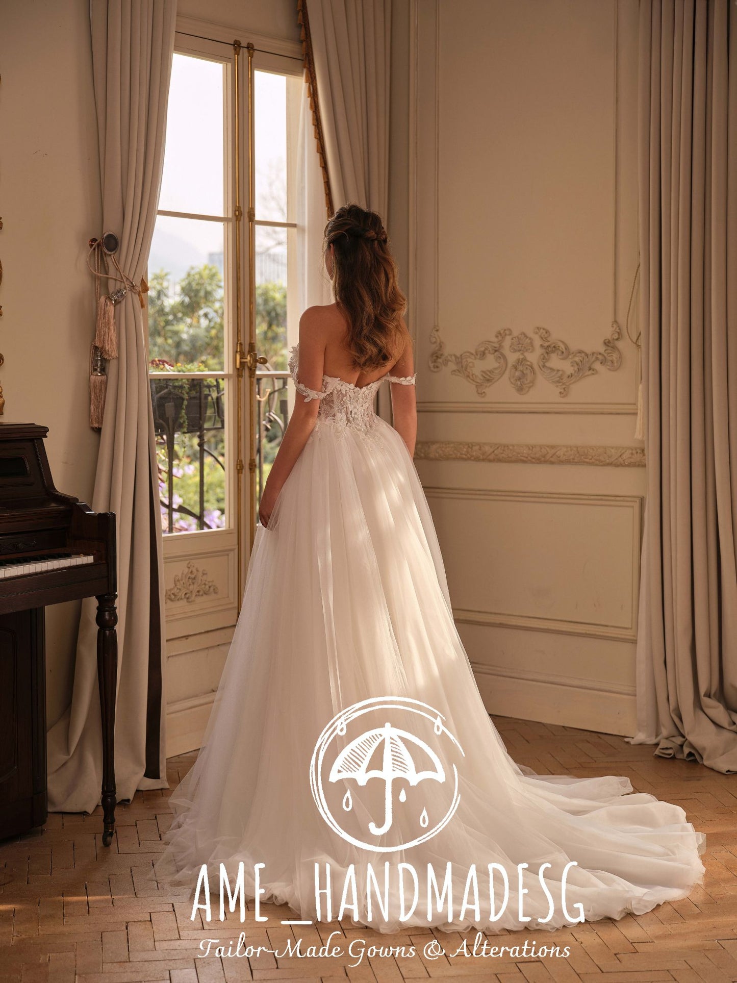 Golden Grace – An Off-Shoulder Lace A-Line Bridal Gown with Ethereal Tulle Sleeves
