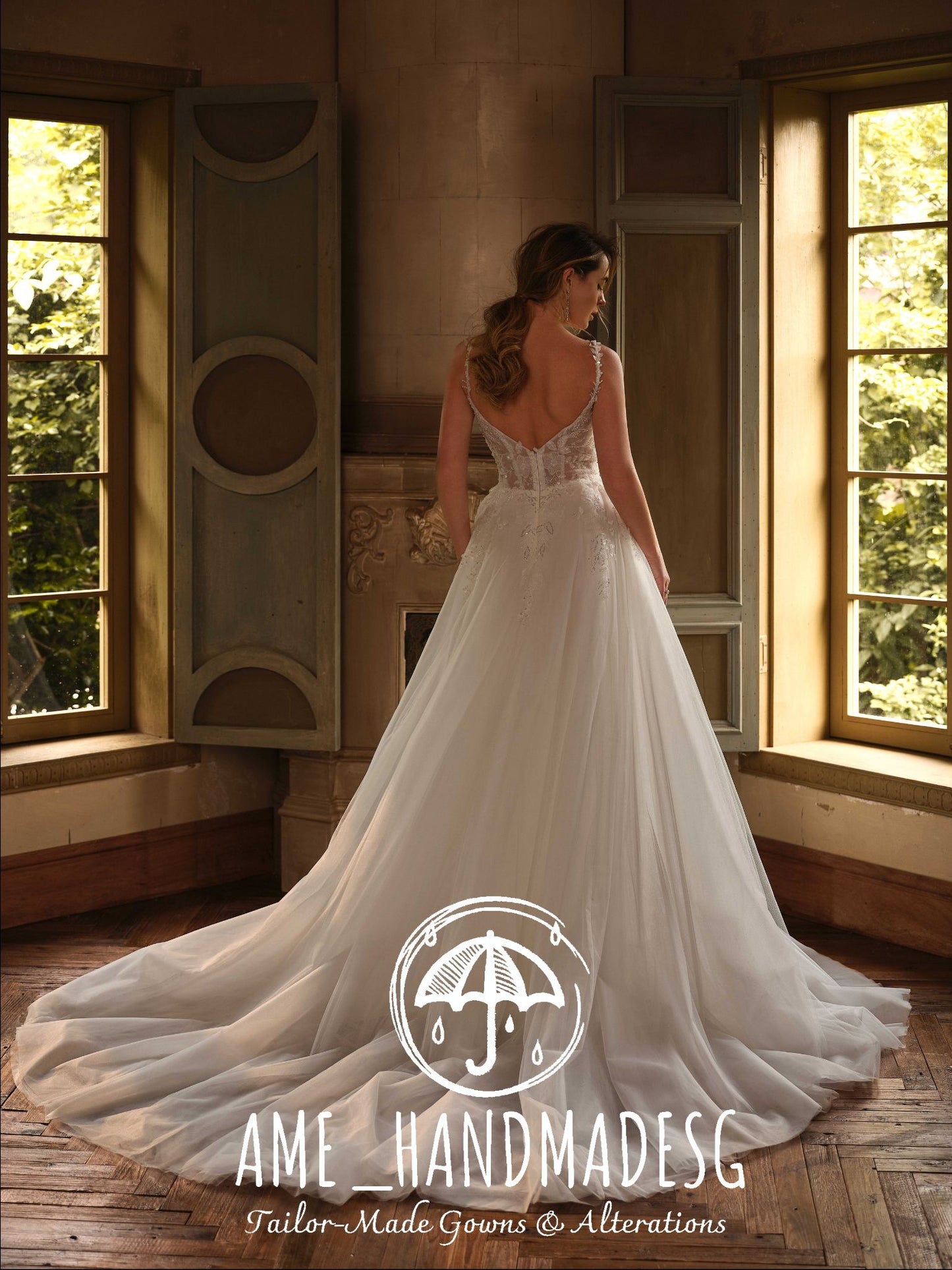 Serene Blossom – A Lace A-Line Bridal Gown with Delicate Straps and Soft Tulle Train