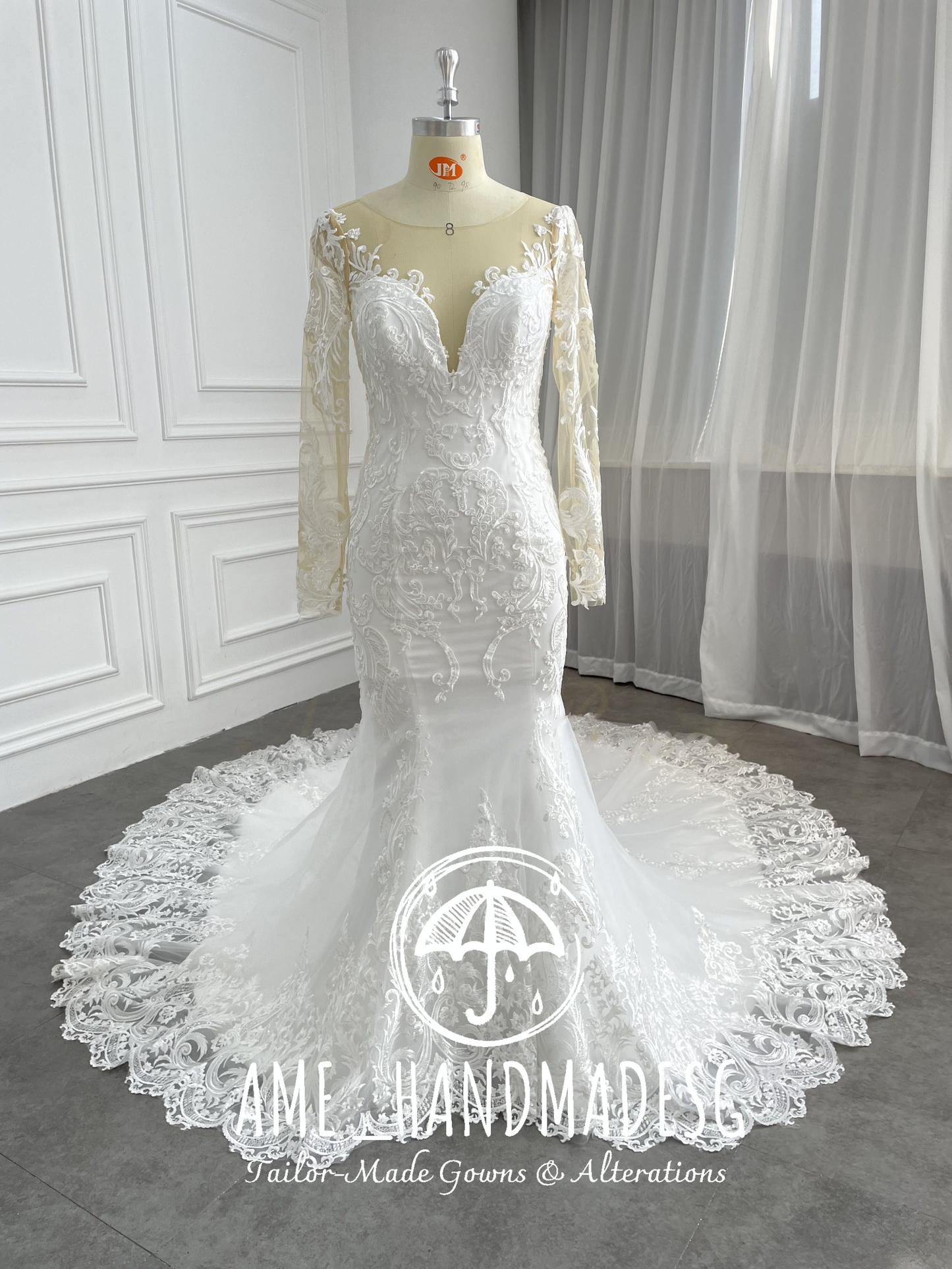 Elegant Long-Sleeve Lace Mermaid Wedding Gown with Illusion Neckline & Chapel Train