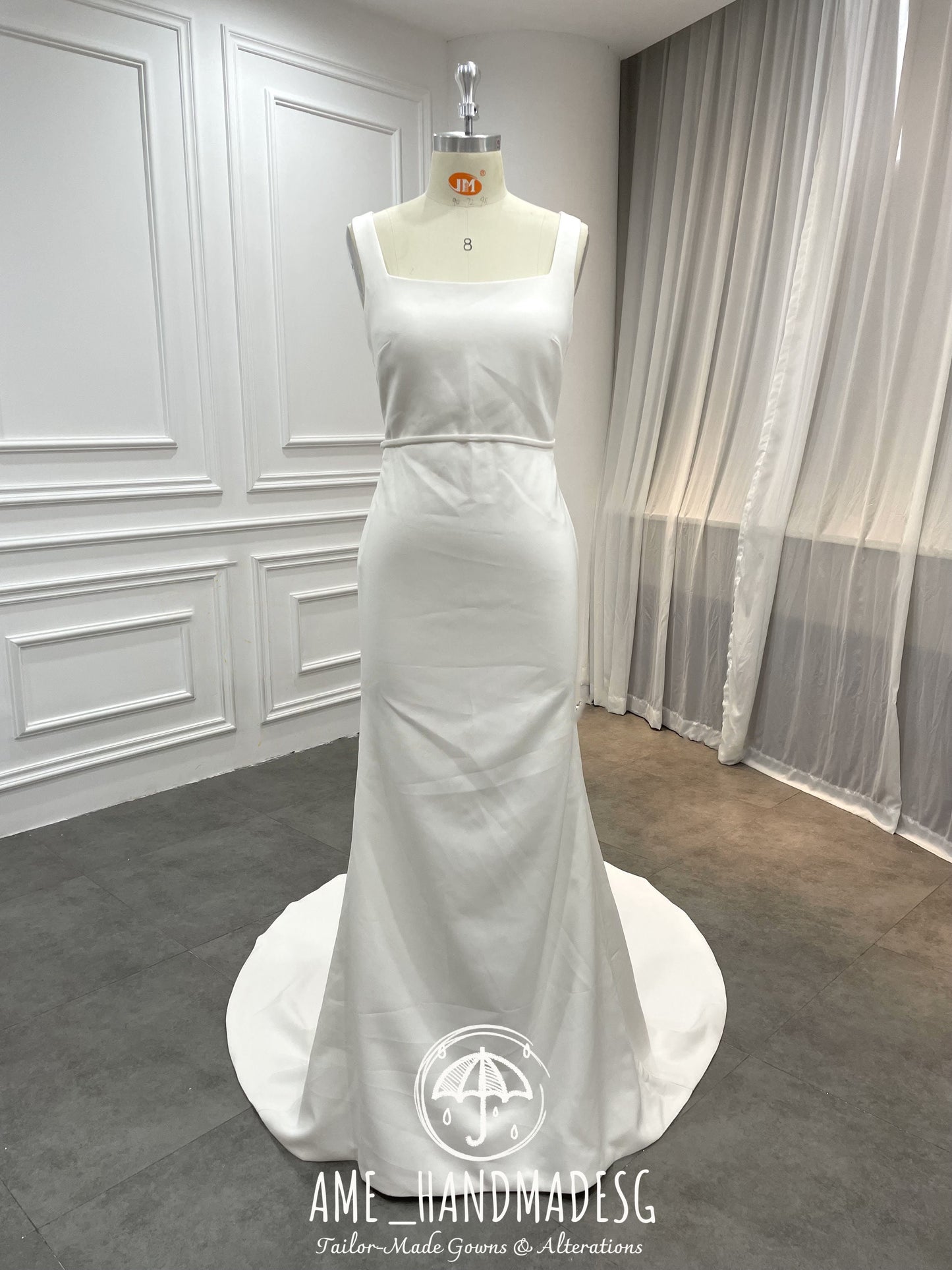 Timeless Minimalist Elegance Gown with Statement Bow Back