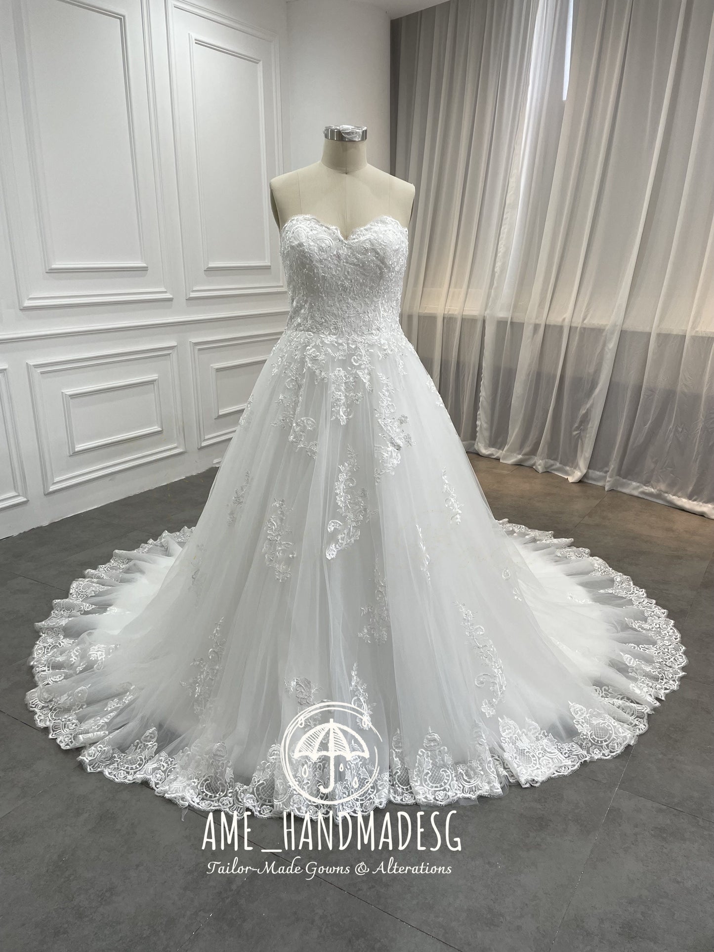 Timeless Romance Strapless Ball Gown with Scalloped Lace Train