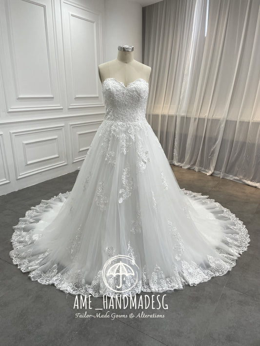 Timeless Romance Strapless Ball Gown with Scalloped Lace Train