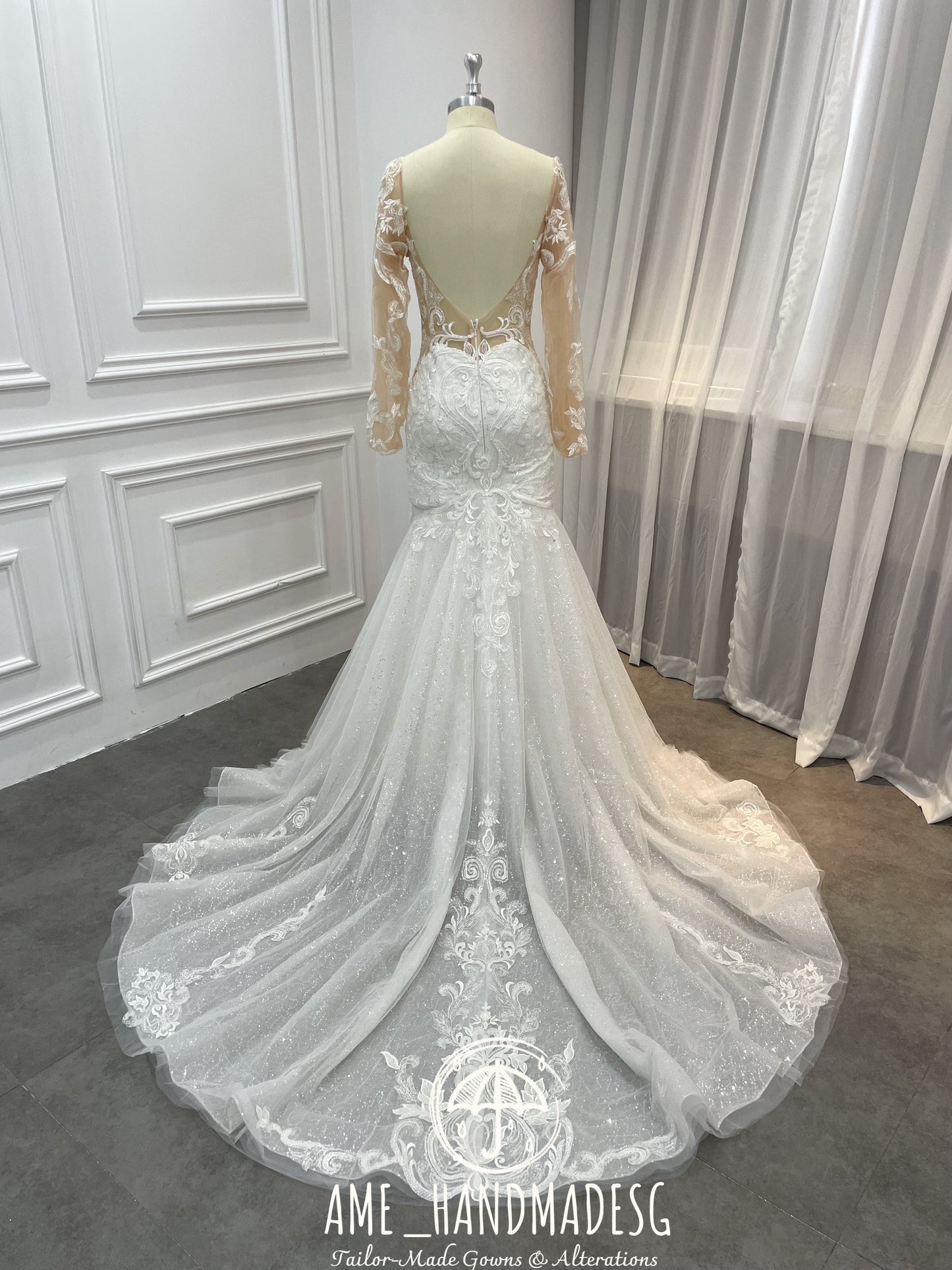 Enchanted Elegance Mermaid Gown with Illusion Sleeves and Sparkling Train