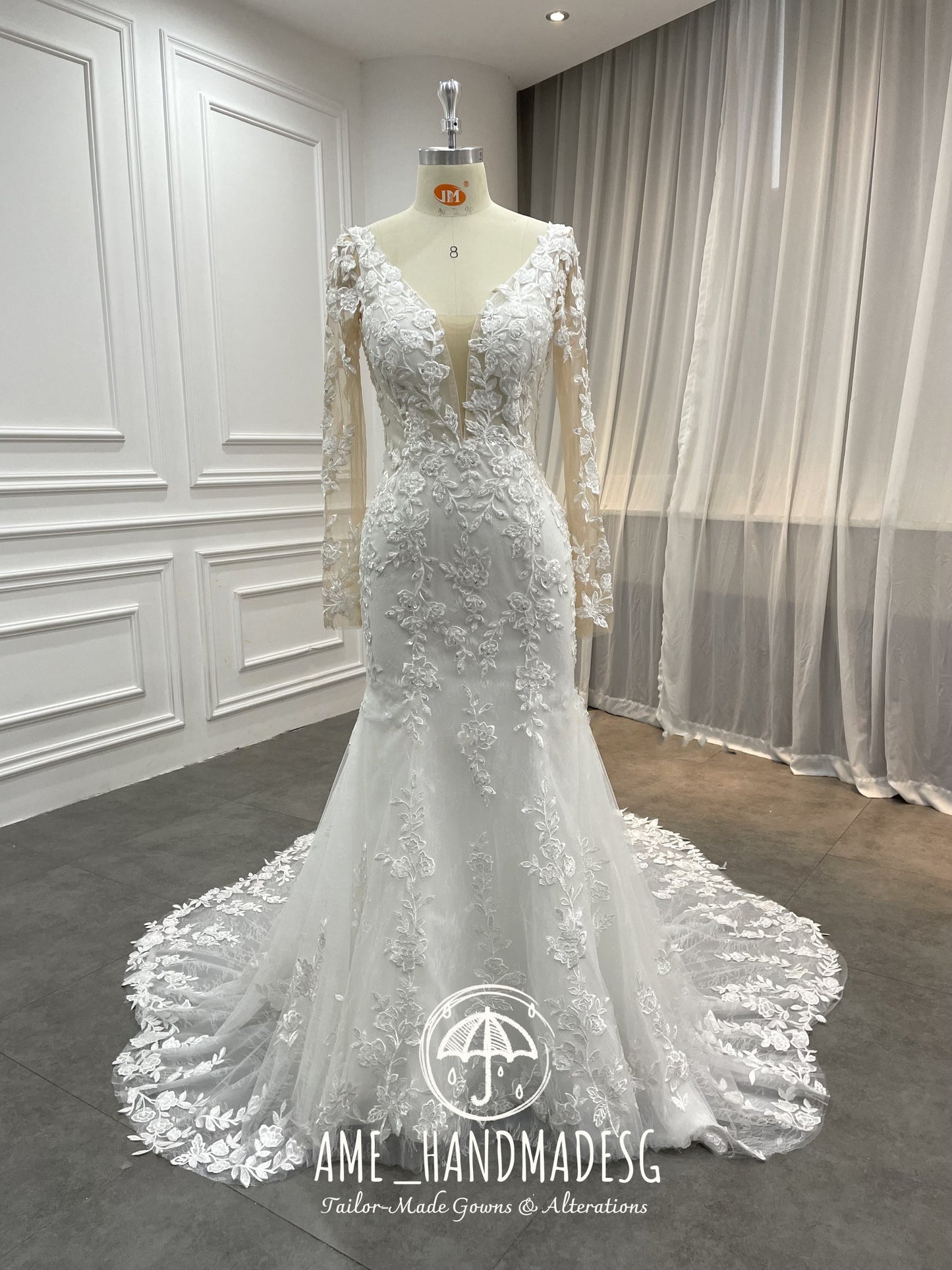 Enchanted Elegance Mermaid Gown with Illusion Sleeves and Floral Train