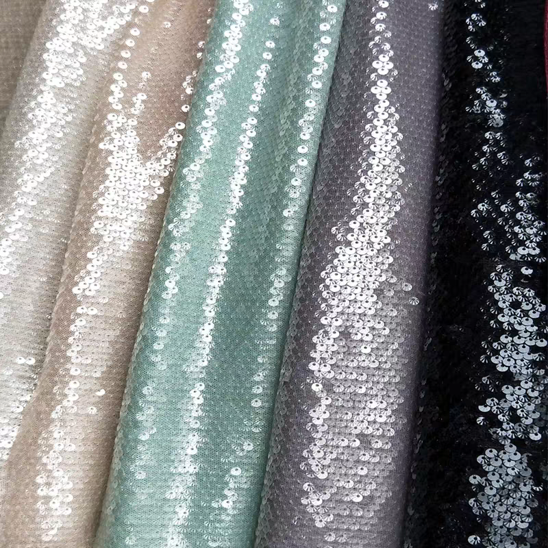 Shell shaped transparent fish scale sequin fabric fashion clothing styling background designer fabric