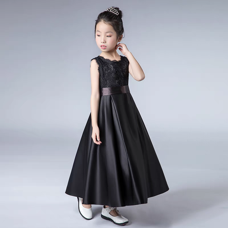 Girl in black lace top gown with satin skirt and silver tiara