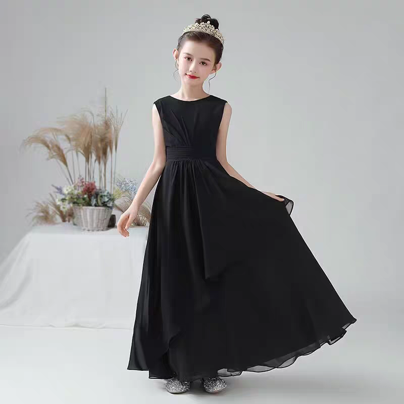 Girl wearing a black sleeveless formal dress with a jeweled tiara.