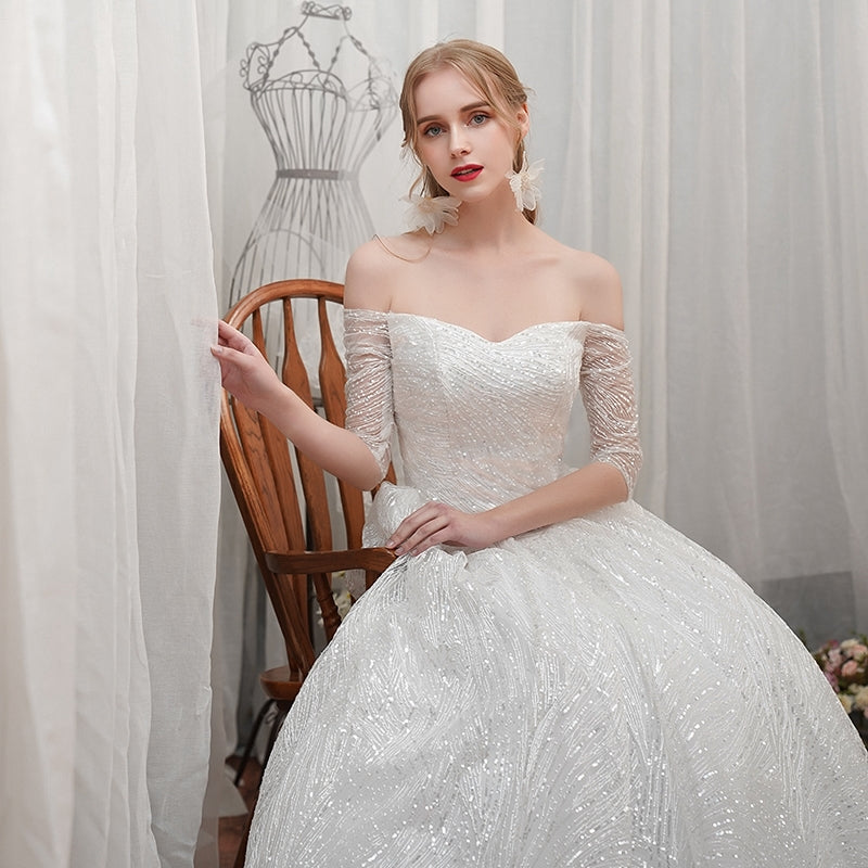 A word shoulder master wedding dress new bride small son out of the yarn French simple show thin star girl light.