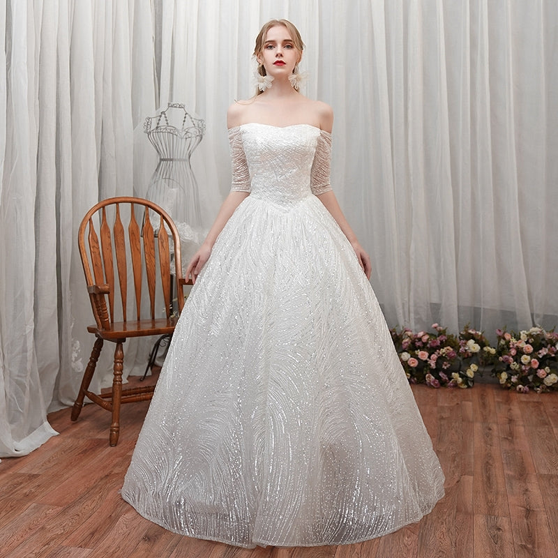 A word shoulder master wedding dress new bride small son out of the yarn French simple show thin star girl light.