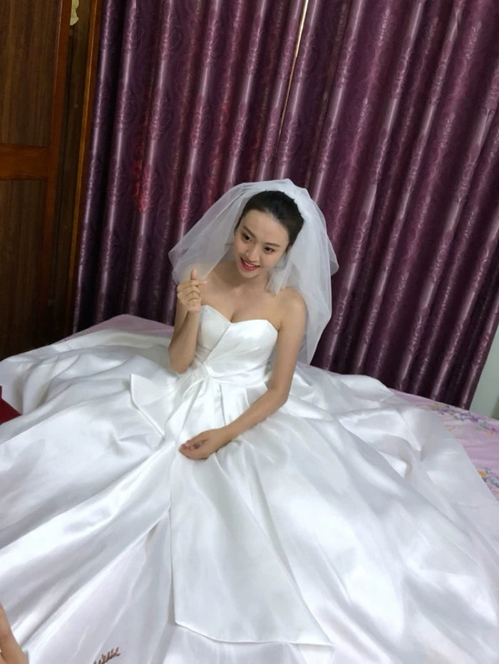 Wipe chest high waist temperament satin wedding dress out of the main yarn bride wedding simple drag tail show thin wedding dress 2020
