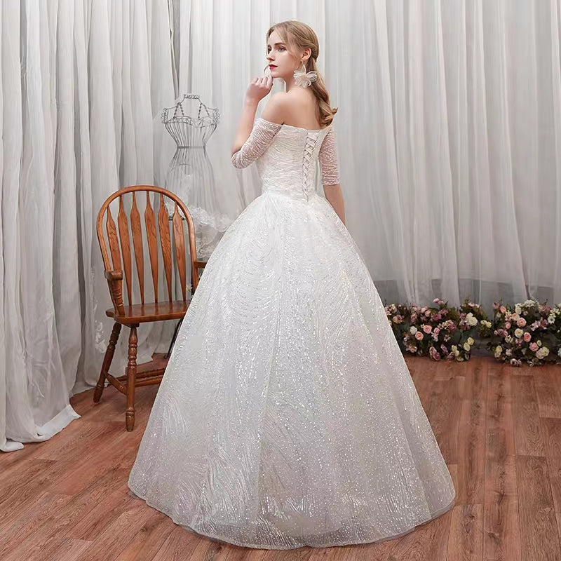 A word shoulder master wedding dress new bride small son out of the yarn French simple show thin star girl light.