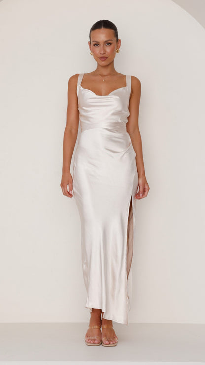 Champagne satin maxi dress with cowl neck and side slit.
