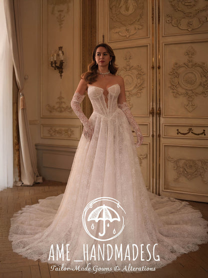 Regal Allure: A Couture Lace Bridal Gown with Gloves