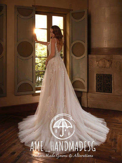 Luminous Romance – A Lace A-Line Bridal Gown with Soft Tulle Train