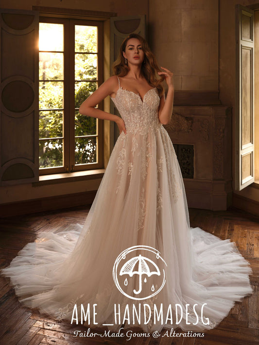 Luminous Romance – A Lace A-Line Bridal Gown with Soft Tulle Train