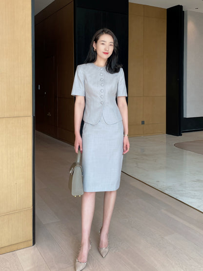 Elegant Light‑Luxury Short‑Sleeve Suit Set with Hip‑Accented Skirt