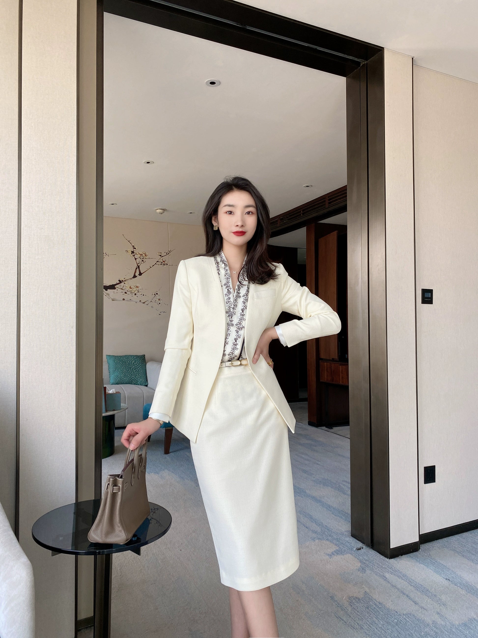 Off-White Elegant Fitted Jacket with Matching Skirt Chanel Style