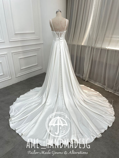 Pure Grace — A Timeless Satin Bridal Gown