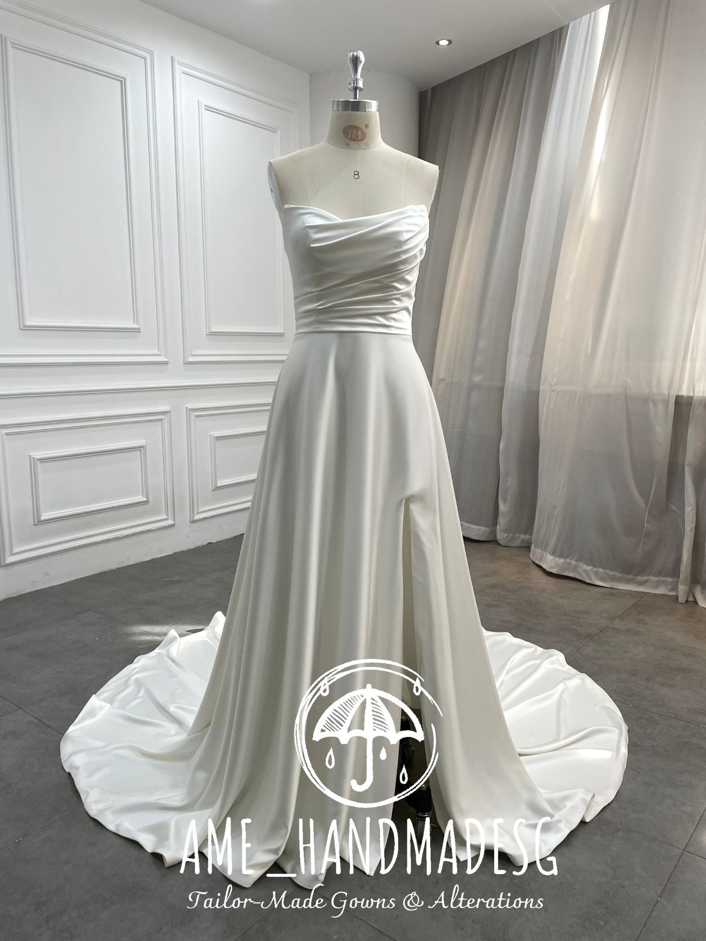 Timeless Serenity: A Classic Satin A-Line Wedding Gown with Elegant Train