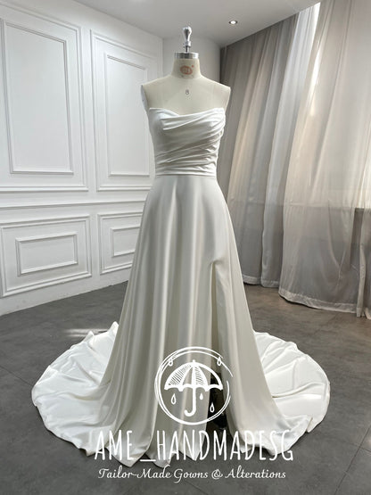 Timeless Serenity: A Classic Satin A-Line Wedding Gown with Elegant Train