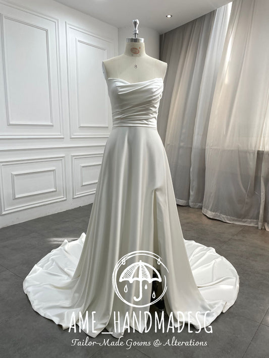 Timeless Serenity: A Classic Satin A-Line Wedding Gown with Elegant Train