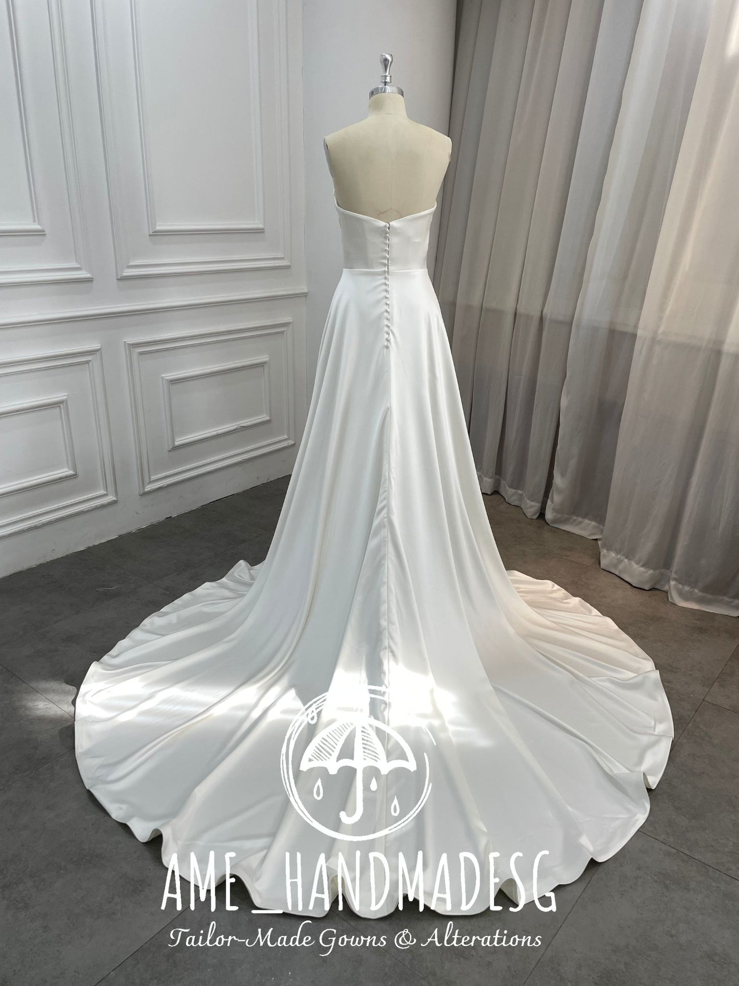 Timeless Serenity: A Classic Satin A-Line Wedding Gown with Elegant Train