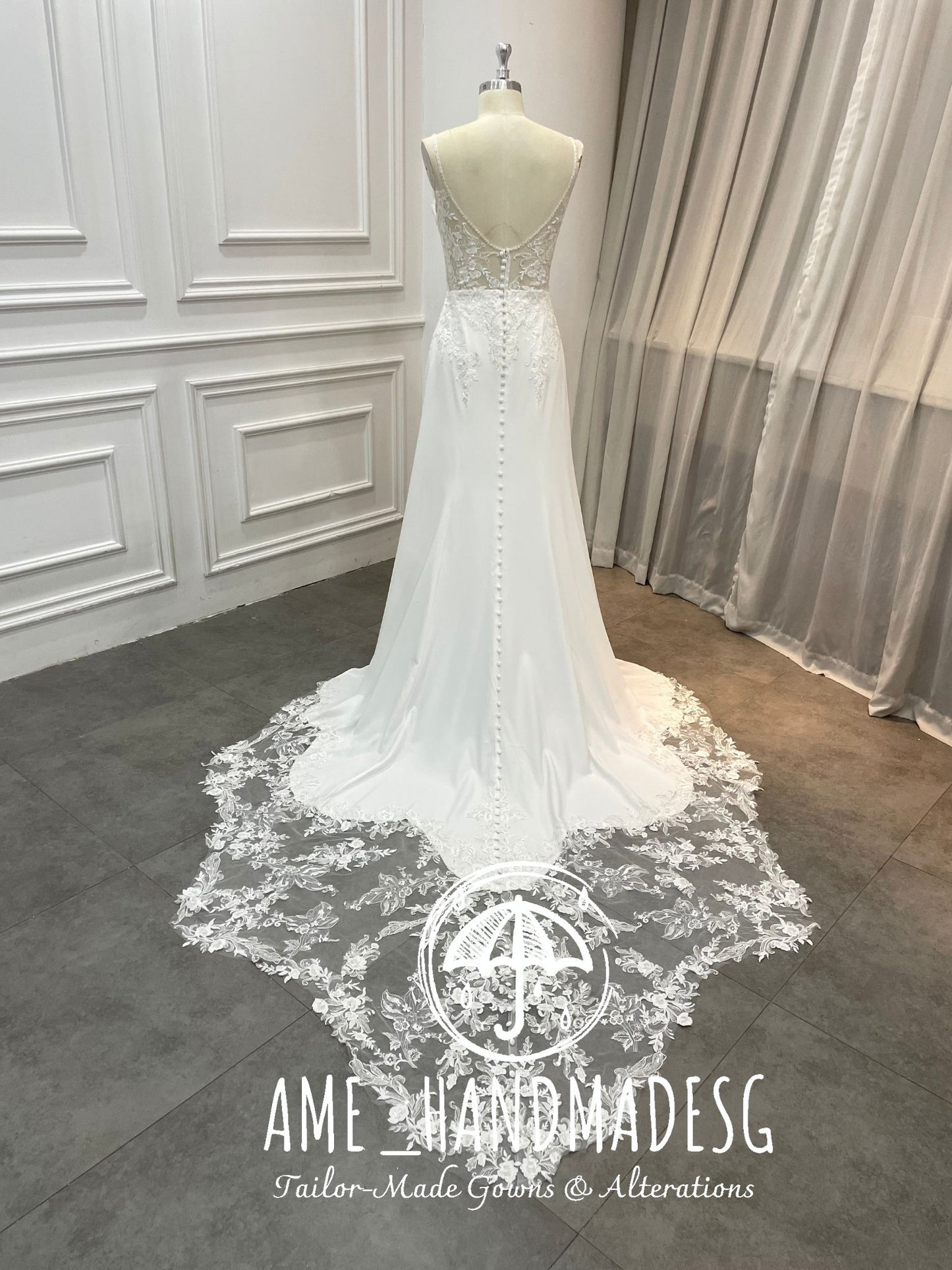 Whispered Elegance — Illusion Back Lace Wedding Gown with Buttoned Train
