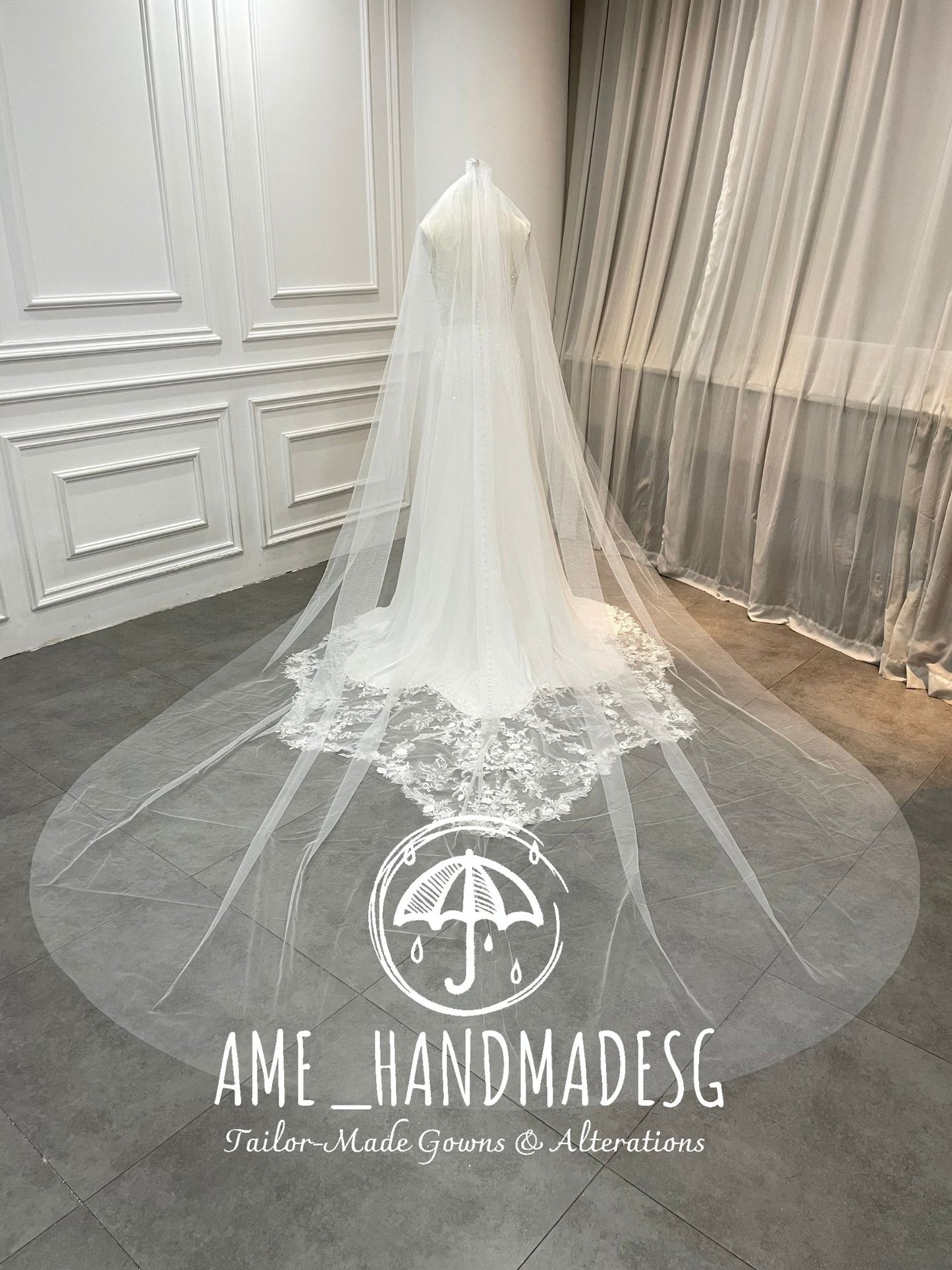 Whispered Elegance — Illusion Back Lace Wedding Gown with Buttoned Train