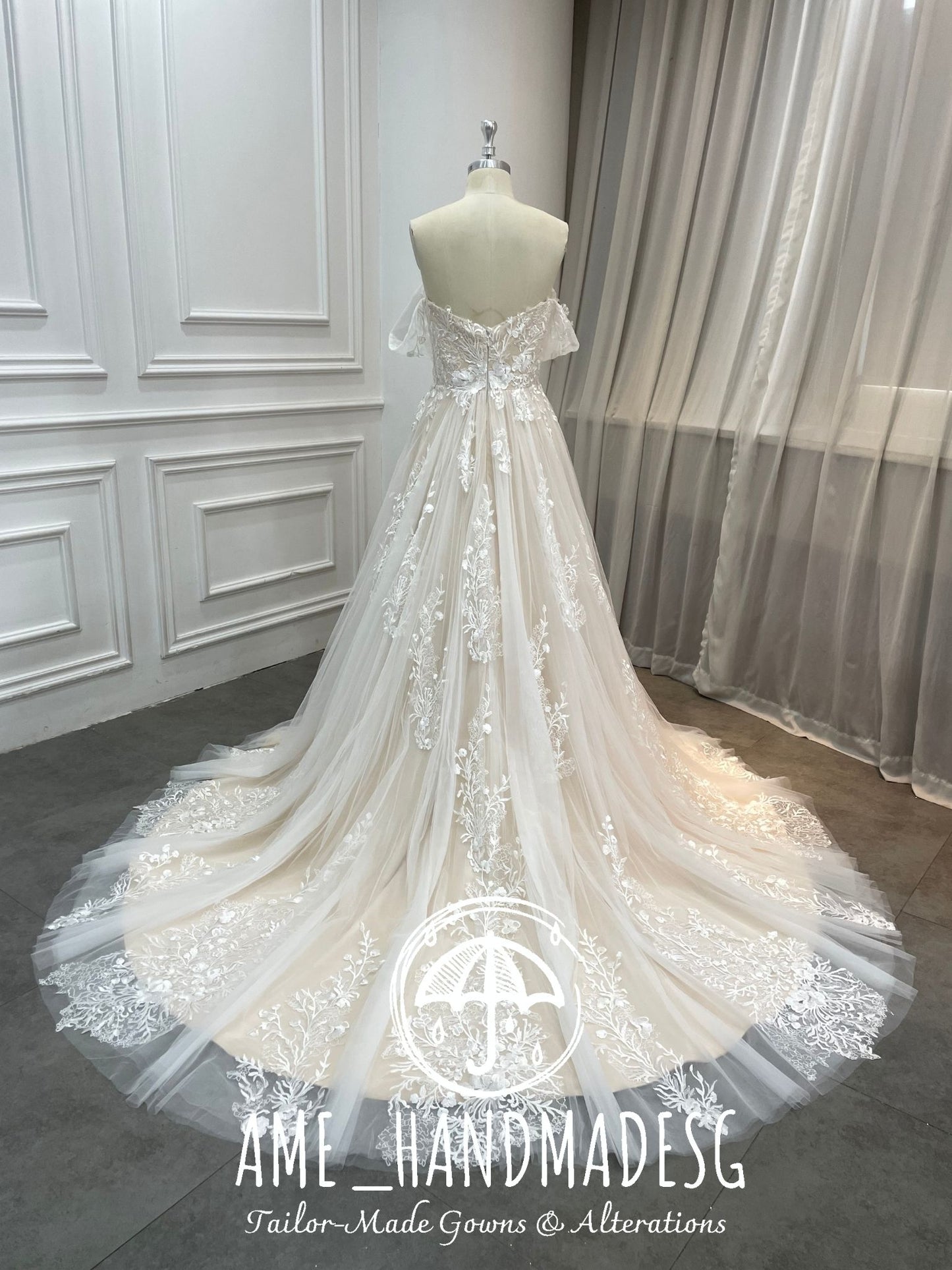 Ethereal Bloom — Off-Shoulder Lace A-Line Wedding Gown with Flowing Illusion Train