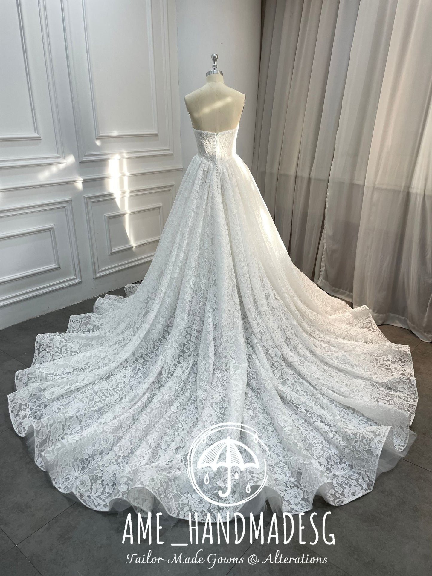 Lace Reverie: A Timeless Strapless Ball Gown in Pure Romance