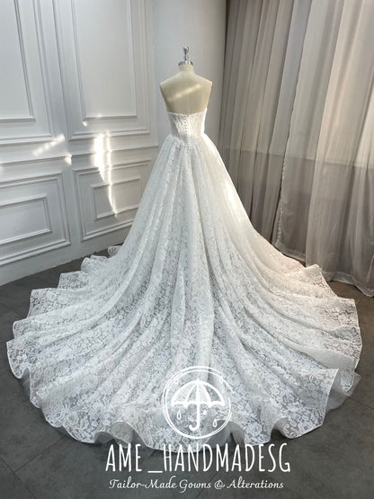 Lace Reverie: A Timeless Strapless Ball Gown in Pure Romance