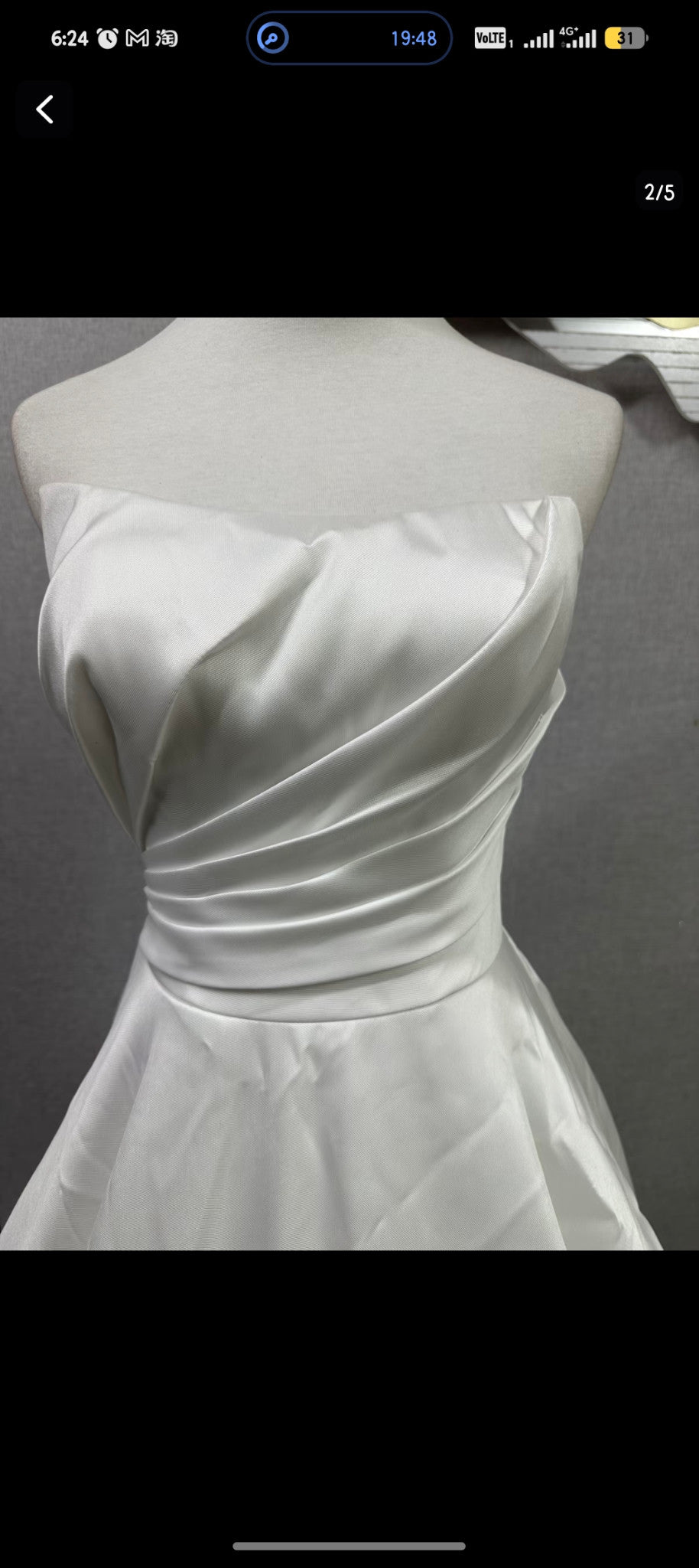 Original reference photograph of strapless pleated off-white Mikado satin wedding gown, front bodice close-up.