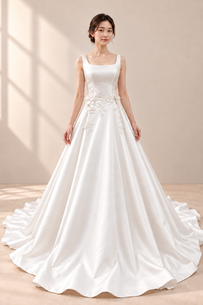 AI-assisted presentation edit: full front of the off-white square-neck floral-appliqué A-line studio sample wedding gown.