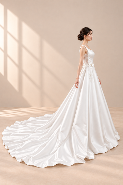 AI-assisted presentation edit: side view of the off-white A-line wedding gown and long train.