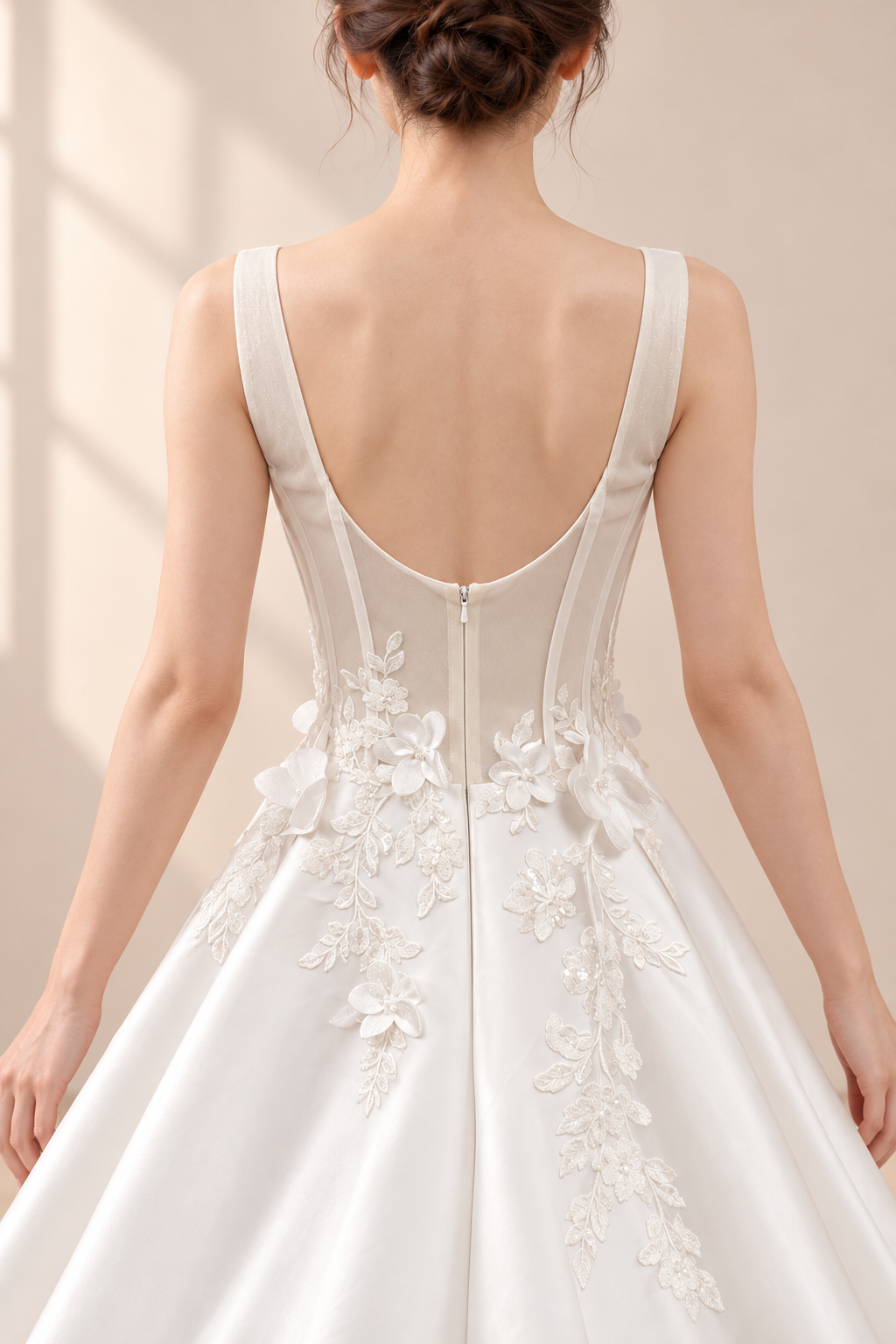 AI-assisted presentation edit: deep scoop back, sheer boned panels and floral-appliqué waist of the wedding gown.