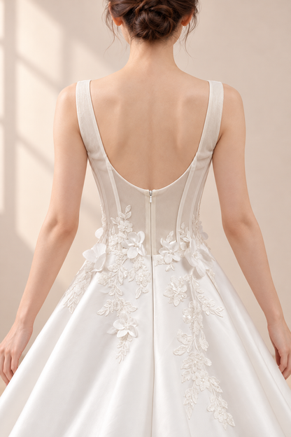AI-assisted presentation edit: deep scoop back, sheer boned panels and floral-appliqué waist of the wedding gown.