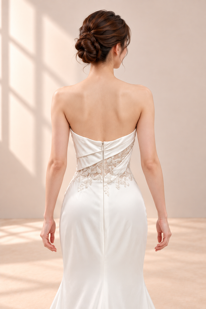 AI-assisted model visualisation: back bodice showing asymmetric draping, sheer lace inset and centre zip. Refer to original photographs for exact lace details.