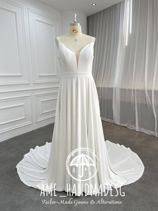 Minimalist A-Line Satin Wedding Gown with Plunging V-Neckline & Flowing Train