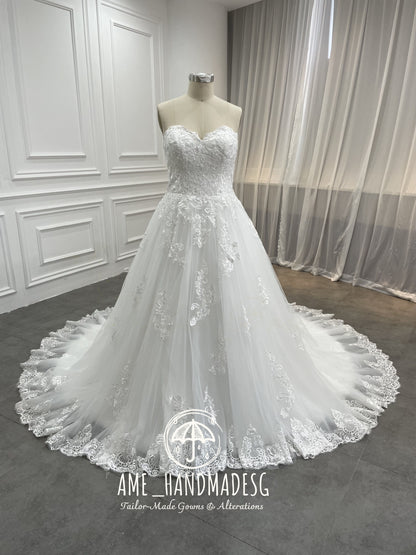 Timeless Romance Strapless Ball Gown with Scalloped Lace Train