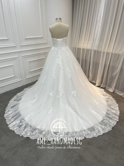 Timeless Romance Strapless Ball Gown with Scalloped Lace Train