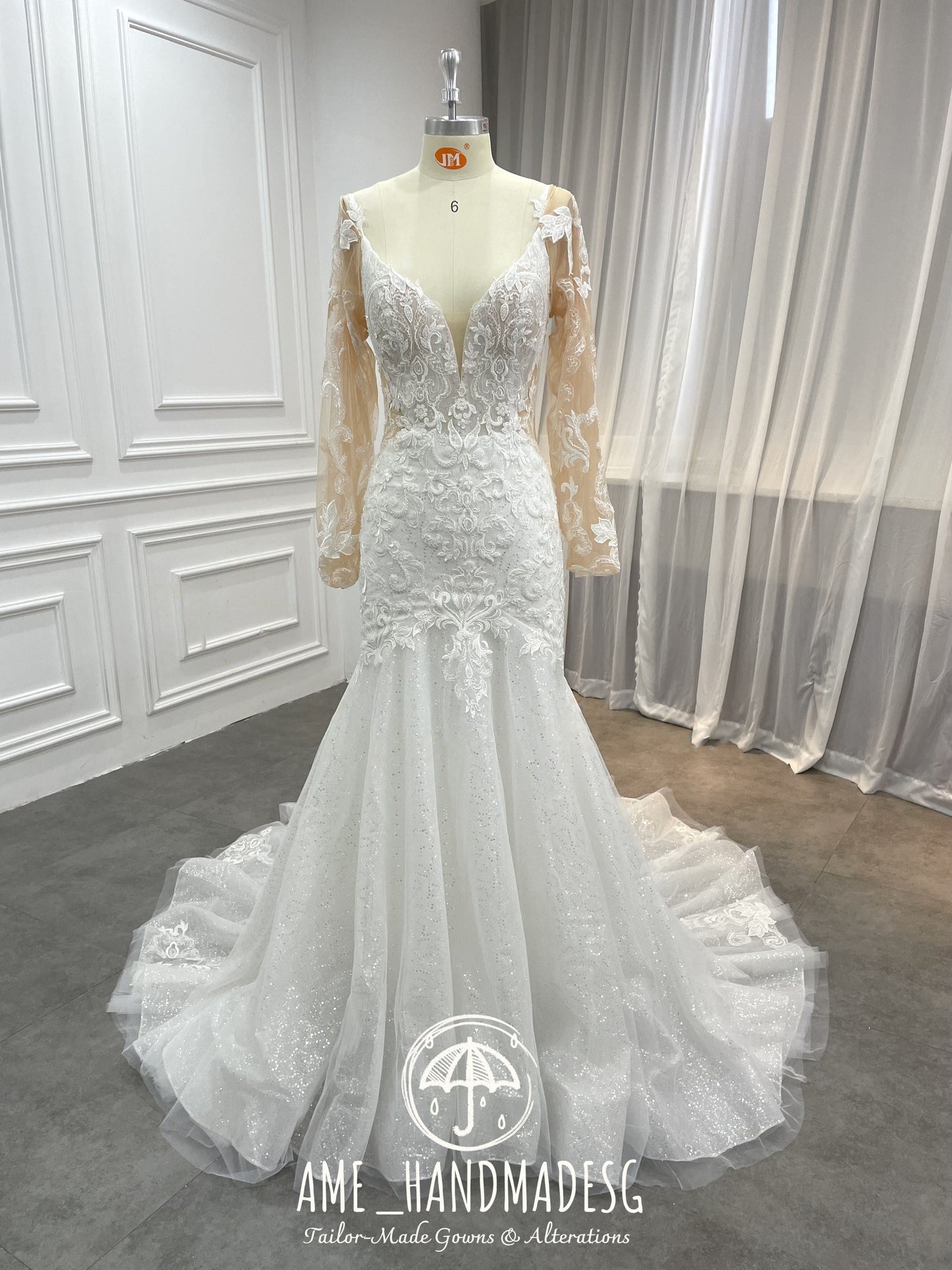 Enchanted Elegance Mermaid Gown with Illusion Sleeves and Sparkling Train