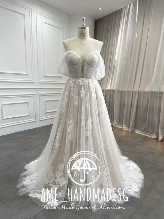Ethereal Off-Shoulder Tulle Wedding Gown with Floral Lace Appliqué & Flowing Train