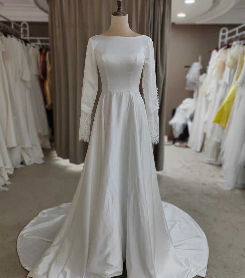 Special Design Long Sleeve Satin Backless Ivory O-Neck A-Line Bridal Gown Wedding Dress