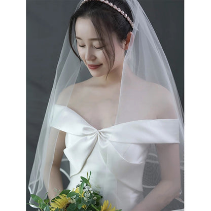 A word shoulder satin light wedding dress new Sen line brigade shoot super fairy fish tail repair thin bride out of the dress girl.