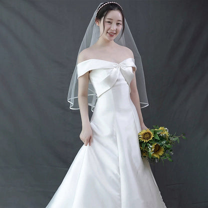 A word shoulder satin light wedding dress new Sen line brigade shoot super fairy fish tail repair thin bride out of the dress girl.